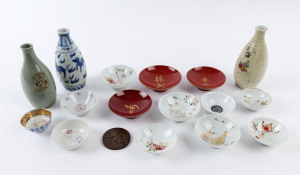 WW2 Japanese military themed sake cups and jars as well as a Japanese WW2 medal, (17 items), the largest 16cm high