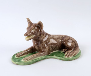 BOSLEY Pottery dog door stop, South Australian origin, ​15.5cm high, 30cm long