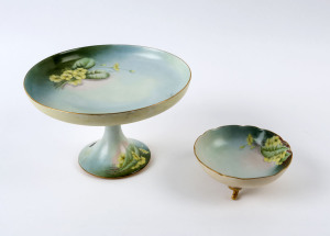 A hand-painted porcelain compote and bowl, the bowl signed "F.A.R.", the compote 14cm high,24cm diameter