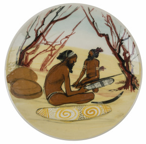MARTIN BOYD pottery plate with sitting Aboriginal figures, incised "Martin Boyd, Australia", 26cm diameter
