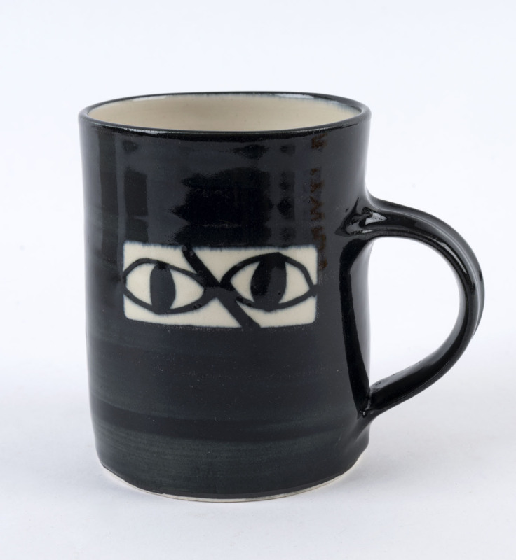 SIDNEY NOLAN "Ned Kelly" pottery mug, signed "Nolan at Heide 1946-47, Dobell 1997, 4/50", 10.5cm high