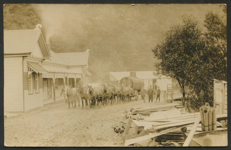 A1 MINE SETTLEMENT: early 1900s real photo monochrome image showing horse and carriage entering the township, unused. [Located north of Woods Point in the Shire of Mansfield, the township was named 'A1' as a tribute to quality of the gold mined in the ar