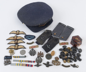 RAAF Warrant Officer 1950s cap and brass cap badge, plus assorted RAAF badges, buttons, dog tag, epaulettes and stripes. ​(approx 50 items)