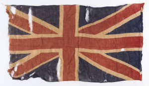 WORLD WAR ONE - UNION JACK: WWI British street flag, screen printed on unbleached cotton, distressed condition, 40 x 68cm.