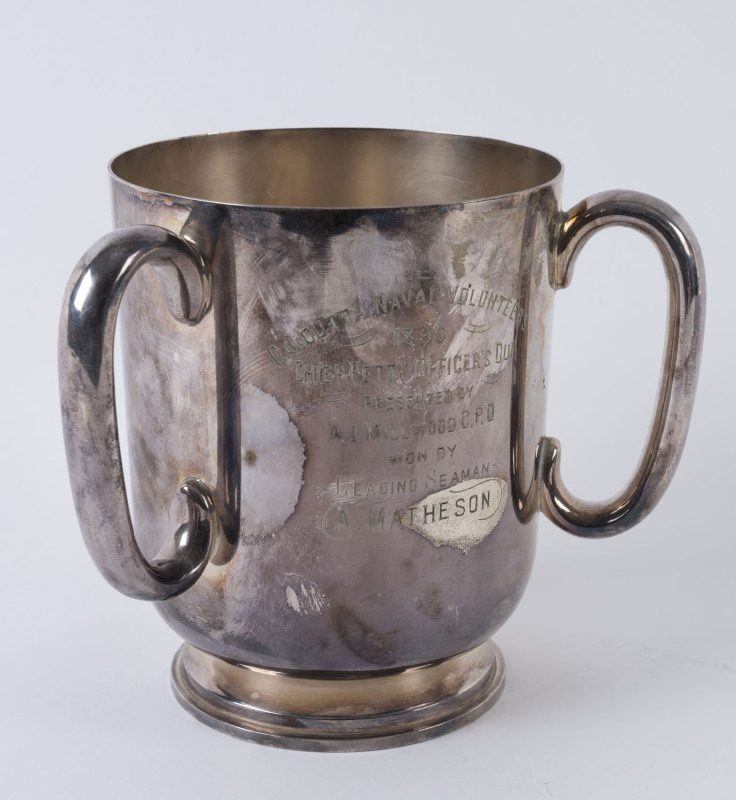 ELKINGTON & CO: 1890 Calcutta Naval Volunteers "Chief Petty Officer's Cup" silver plate three-handled trophy, height 15cm.