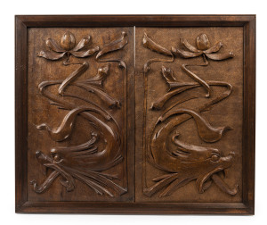 ROBERT PRENZEL & STUDENT two carved panels depicting a mythical beast and waterlilies, early 20th century. The left panel carved by Prenzel, the right a student copy. Inscription verso attributing the copy to Mrs. Dowdell with a partially legible further 