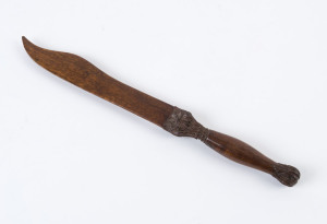 An Australian carved timber paper knife, 19th century, 25cm long