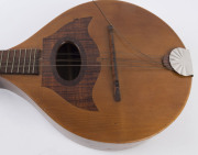 FLAT BACK MANDOLIN: circa 1930s, Gidgee wood fretboard with mother of pearl inlays, King Billy Pine soundboard, Queensland Maple back, Blackwood sides, comes with lined British made case, 64.5 x 26cm, case 67 x 28cm. - 3