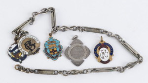 Cricket Club fobs comprising 1892 South Melbourne Football Club (Cricket Team Premiership), 1911-12 Brunswick C.C., 1924-25 Footcray C.C., 1926-27 and 1927-28 Hawthorn - East Melbourne; some on a silver chain. (5).