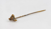 An antique gold nugget stickpin, 19th century, ​6.5cm long, 2.2 grams