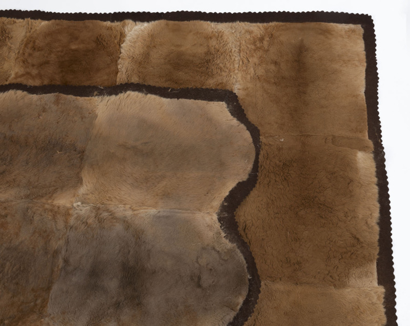 A pair of kangaroo skin rugs with original brown felt backing, late 19th century, ​165 x 175cm