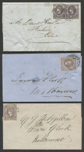 VICTORIA - Postal History: 1859 postal history trio with rouletted 2d Emblems Laid Paper frankings comprising (Feb. 7 & Feb.9) Melbourne local outers (2) addressed to "Town Clerk", each with a single 2d dull violet (SG.70a) tied by BN '1' cancels, MELBOURNE code 'A' or 'B' backstamps; also (May 8) Geelong to Colac entire with 2d violet (SG.70) pair tied by BN '2' cancels, GEELONG backstamp; minor blemishes, fine overall. (3 items)