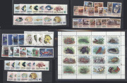 CHRISTMAS ISLAND: 1960s-90s array of sets noting 1968-70 Fish (2 sets) & 1990 Transport, plus many other 1980s era commemoratives sets in blocks of 4, and a few M/Ss; also a little COCOS ISLAND including 1988-89 Flora set; all fresh MUH. (500 approx)