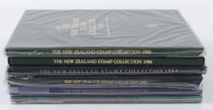 NEW ZEALAND: YEARBOOKS: comprising 1984, 1986 (2, one without plastic sleeve), 1988, 1991 & 1992, Retail $300+.