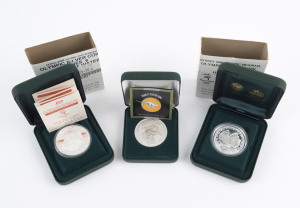 Coins - Australia: Silver: Uncirculated selection comprising RAM 2000 $1 Silver Roo, $5 Olympics "Harbour of Water" & $5 Harbour Land proofs; all housed within original presentation cases; Retail $150+. (3 items)