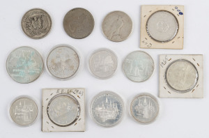 Coins - World: Silver: SILVER COINS: with CANADA 1963, 1964 & 1965 $1 (all VF/EF) and 1976 Montreal Olympics $5 & $10, DOMINICAN REPUBLIC 1939 1 Peso, USA 1922 $1 Liberty & 1971 $1 Eisenhower, Russia 1980 Olympics 10r (2) & 5r (3); some tarnishing to Olympic coins. (13 items)