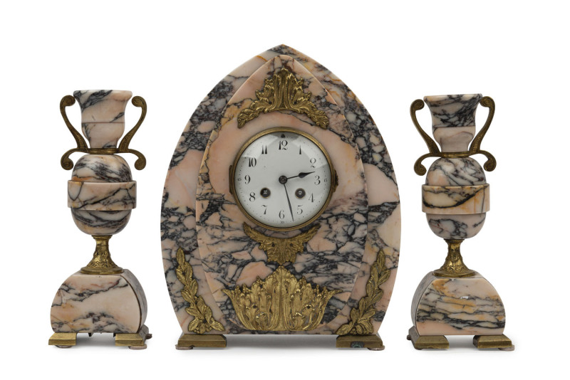 An Art Deco three piece clock set, pink marble and ormolu case with garnitures, circa 1930, ​the clock 34cm high, 27cm wide