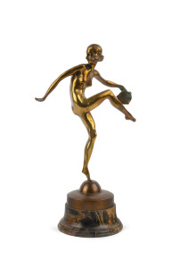 An Art Deco bronze statue of a dancing woman on mottled bakelite base, circa 1930s, 45cm high