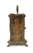 An Art Nouveau mantel clock, lithograph design on a gilded metal case, circa 1900 16cm high. - 2