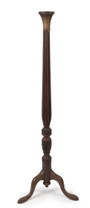 A Georgian mahogany torchère, 19th century, later top and stripped finish, ​163cm high