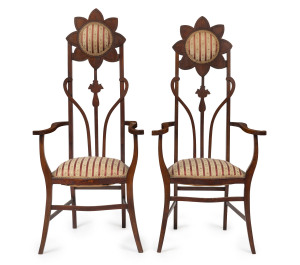 A pair of English carved walnut "Sunflower" parlour chairs, late 19th century, ​130cm high, 56cm across the arms