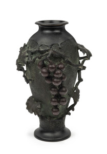 A Japanese bronze mantel vase with applied grape decoration, Meiji period, circa 1900, seal mark to base, ​27cm high