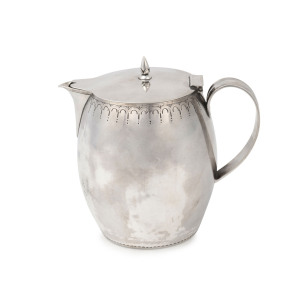 An antique Dutch silver lidded jug with engraved rim, Rotterdam, circa 1826, 11cm high, 14cm wide, 234 grams