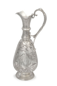 A stunning Aesthetic Movement English sterling silver claret jug in the Japanese style, by Richards & Brown of London, circa 1879, and retailed by "Flavelle Bros. & Roberts, Sydney & Brisbane", with later inscription "General Manager's Trophy Burroughs Ltd. 1932, Won By West Australian Agency, C. Ryan Manager". Burroughs (an American company) started business in 1890 and was famed for producing accounting machines. It is still running and has now turned its hand to computers. 32cm high, 670 gram