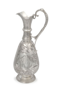 A stunning Aesthetic Movement English sterling silver claret jug in the Japanese style, by Richards & Brown of London, circa 1879, and retailed by "Flavelle Bros. & Roberts, Sydney & Brisbane", with later inscription "General Manager's Trophy Burroughs Lt