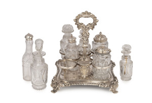 A Regency eight bottle cruet set, Sheffield plate with sterling silver tops by W. Watson & T. Bradbury of Sheffield, dated 1826 and 1827, 24cm high