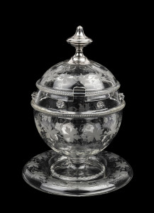 An antique Dutch glass serving bowl with tray and cover, finely decorated with etched grape motif and silver handle, circa 1860, ​28cm high