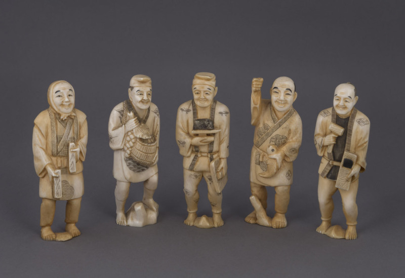 Five Japanese carved ivory peasant figures, Meiji period, the largest 14cm high