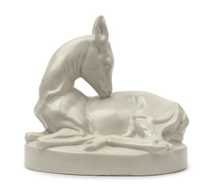 An English Art Deco statue of a deer in the manner of John Skeaping, circa 1930, impressed mark (illegible), 21cm high, 23cm wide