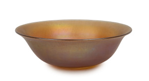 An American iridescent glass fruit bowl, early 20th century, marked "Imperial" with cross mark, ​8cm high, 25cm diameter