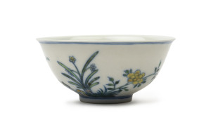A Chinese porcelain bowl with floral enamel decoration, 18th/19th century, 5.5cm high, 12cm diameter