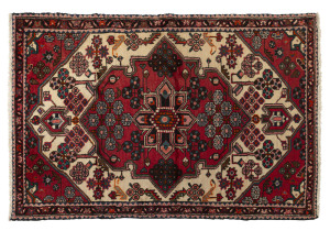 A hand-knotted tribal rug, 20th century, ​168 x 107cm