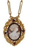 An antique cameo pendant in rare tortoiseshell mount on matching chain, late 19th century, ​the pendant 7.5cm high, chain 66cm long