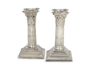 A pair of English sterling silver candlesticks by Mappin & Webb of Sheffield, early 20th century, 16.5cm high