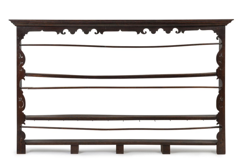 An antique Welsh oak kitchen dresser plate rack, late 18th century, 125cm high, 203cm wide, 17cm deep