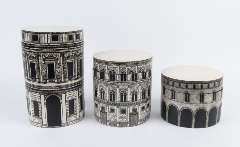 Three Fornasetti inspired ceramic canisters, circa 2000, ​the largest 33cm high