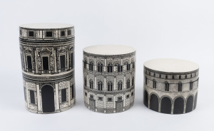 Three Fornasetti inspired ceramic canisters, circa 2000, the largest 33cm high
