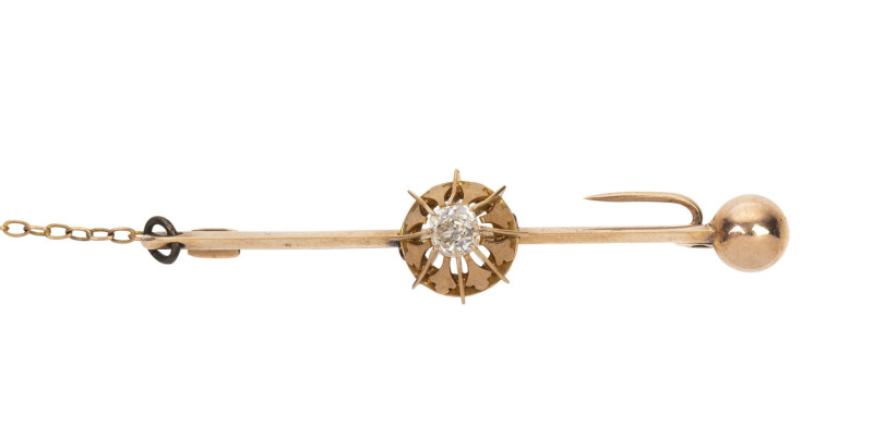 An antique rose gold and diamond solitaire bar brooch, circa 1900, ​5cm long, 4.6 grams total