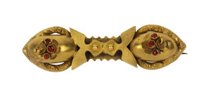 An antique gold and ruby Victorian bar brooch, most likely originally a pair of earrings, 19th century, ​5.5cm wide, 7.8 grams total