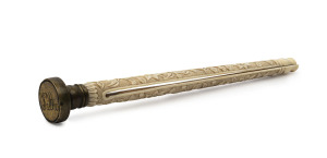 An Anglo-Indian carved ivory letter holder with brass seal end, early 19th century, 14.5cm high