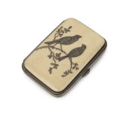 An antique coin purse, carved ivory with blue silk compartment interior, circa 1860s, ​8cm high