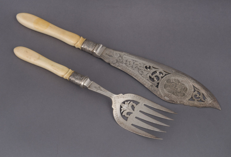 A pair of antique fish servers, silver plate with carved ivory handles, 19th century, ​the knife 32cm long