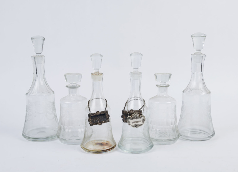 Six glass decanters with Pall Mall acid etched engraving, 20th century, the largest 34.5cm high