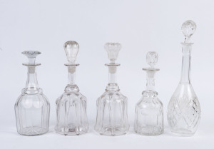 Five assorted antique crystal and glass decanters, the largest 38.5cm high