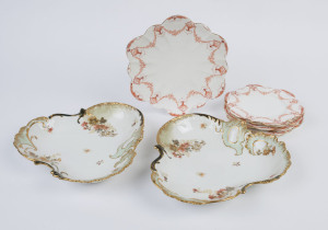 A fine English china cake plate and six matching side plates together with a pair of antique French porcelain serving dishes, 19th century, no factory marks visible, (9 items), the two French dishes 27cm wide