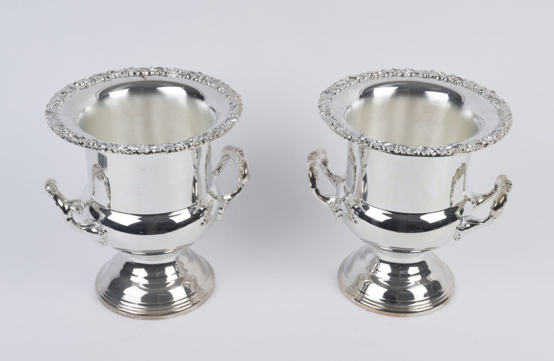 A pair of silver plated champagne ice buckets, 20th century, ​25.5cm high